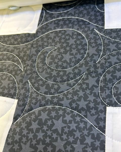 Quilted fabric with star pattern stitching