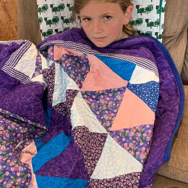 Colorful folded quilt stack