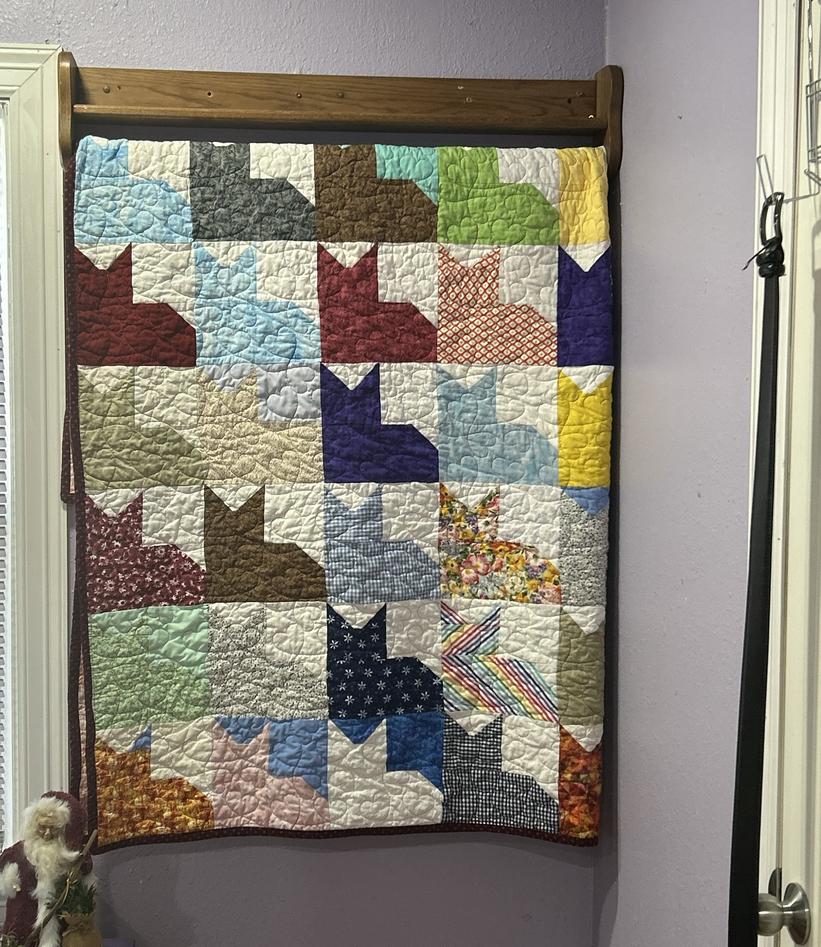 Handmade quilt with pressed flower details